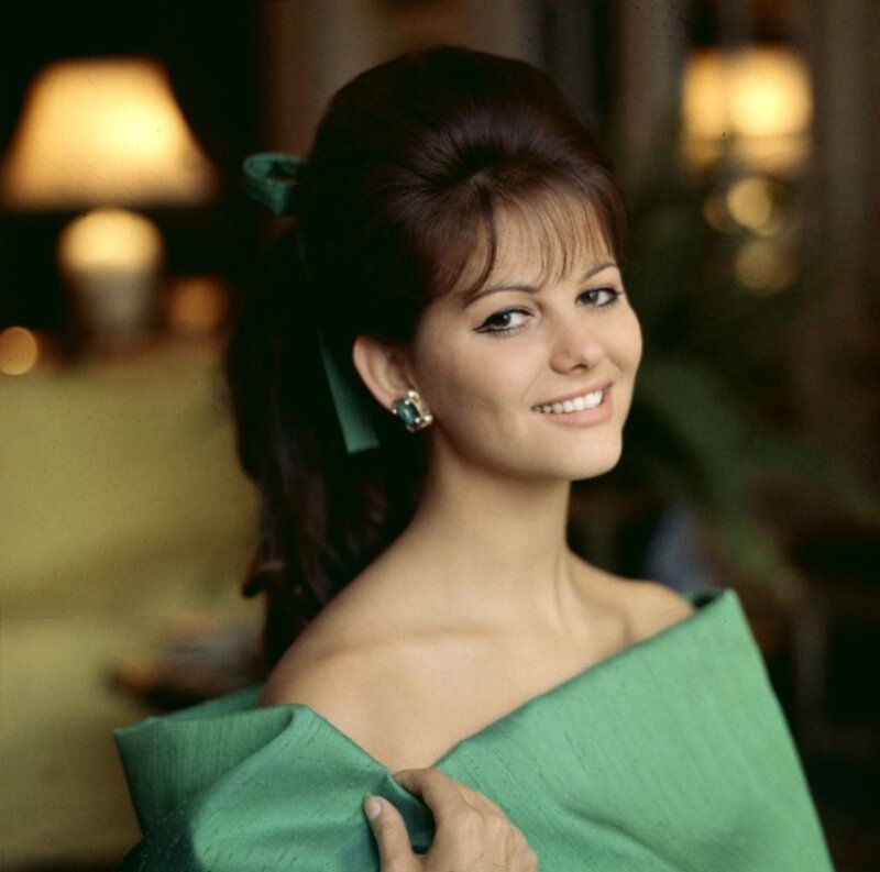 Woman in green dress smiling