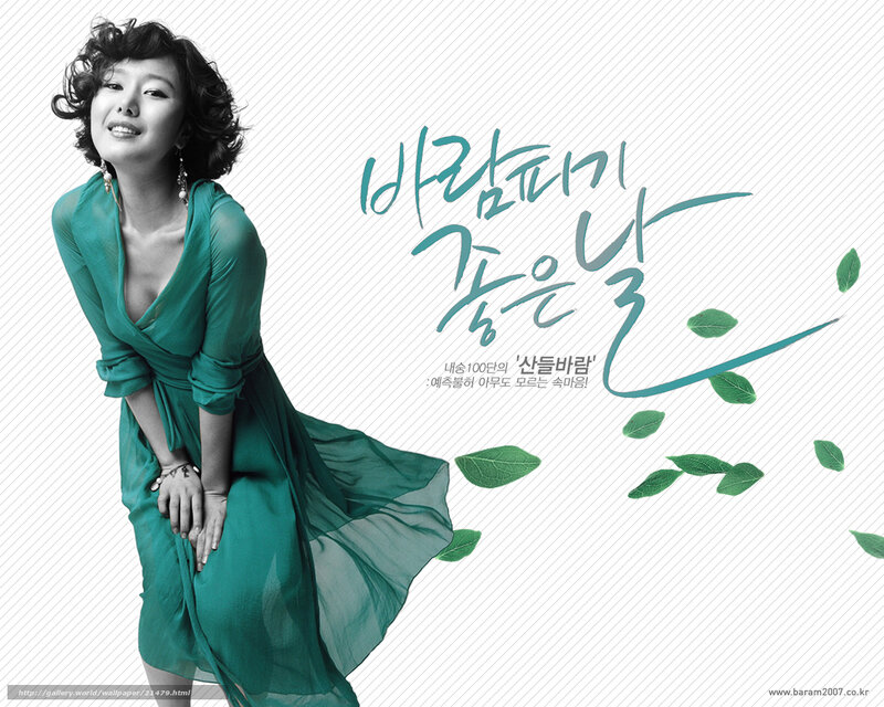 Woman in green dress smiling