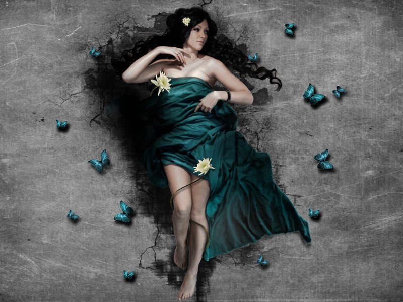 woman in green dress with butterflies