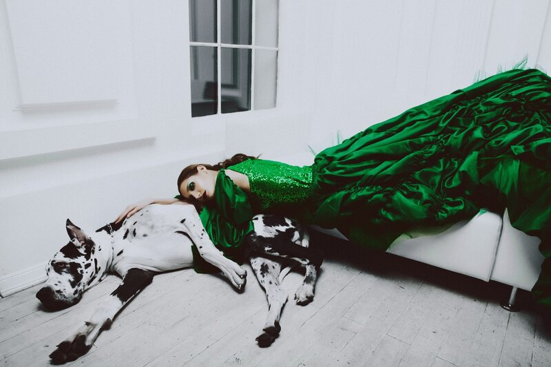Woman in Green Dress with Dog