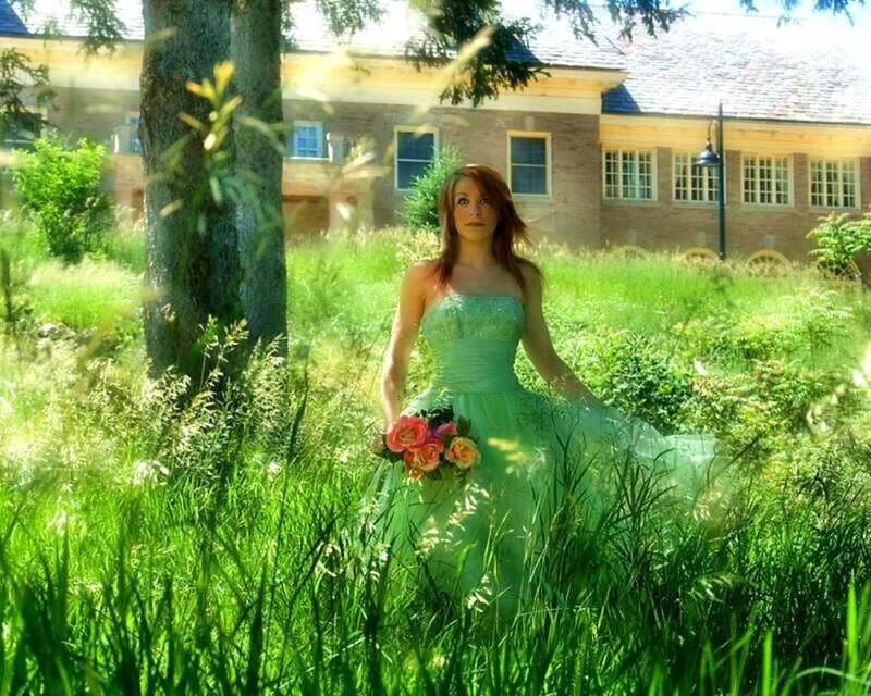 Woman in green dress with flowers