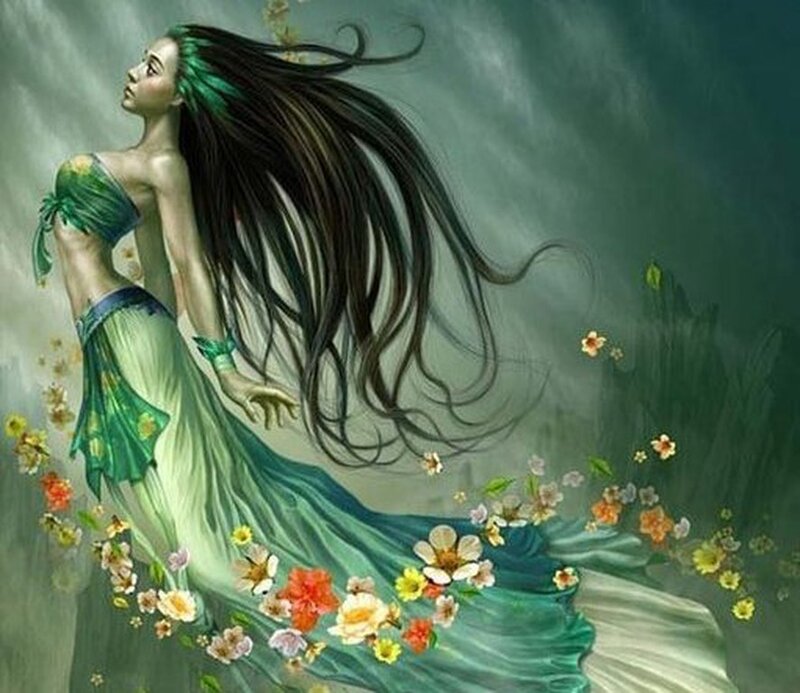 woman in green dress with flowers