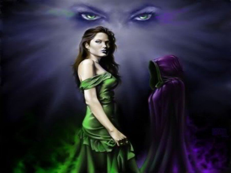 woman in green dress with glowing eyes