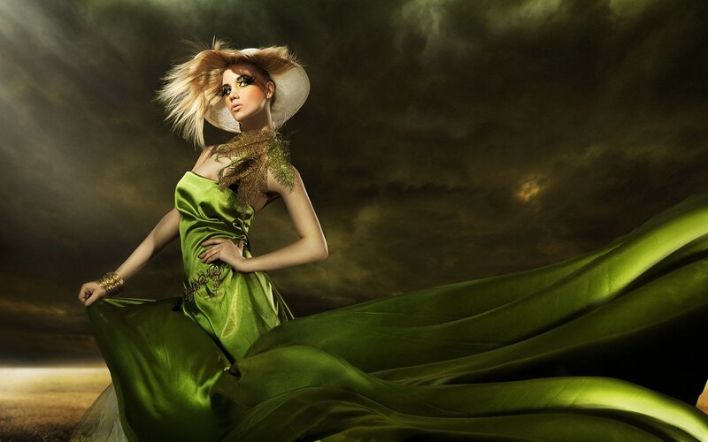 woman in green dress with hat