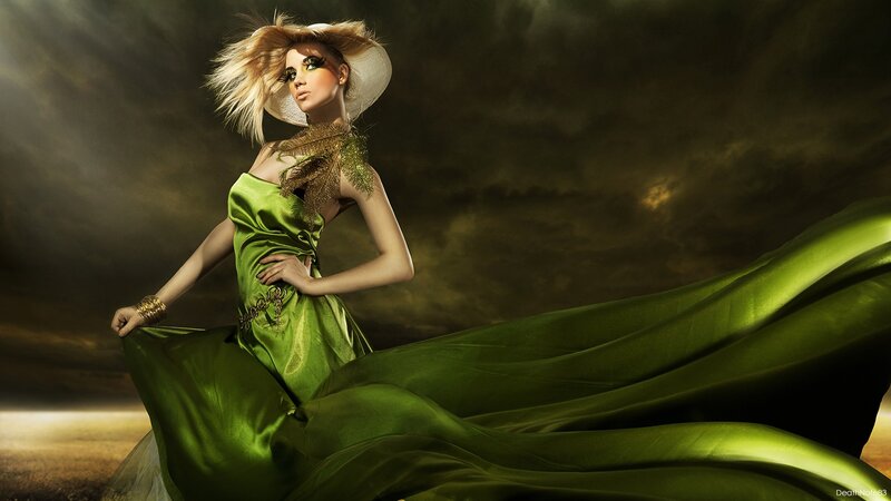 woman in green dress with hat
