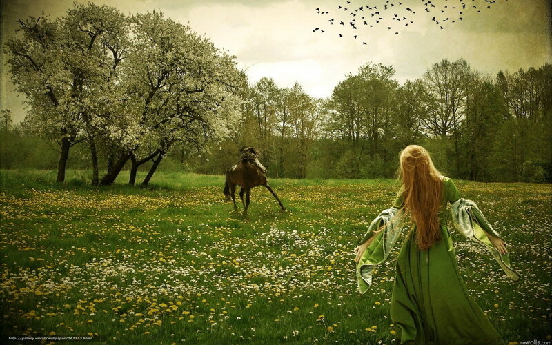 woman in green dress with horse