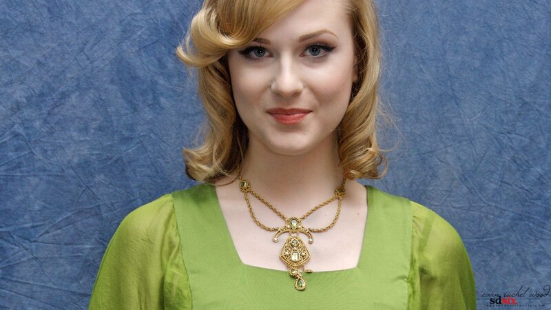 woman in green dress with necklace
