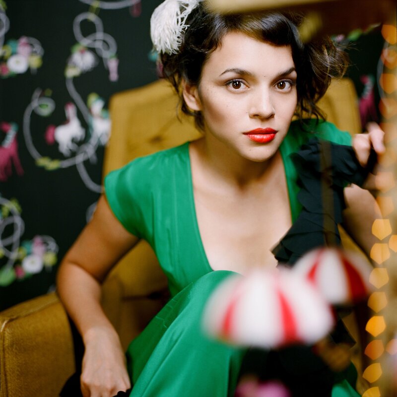 woman in green dress with red lipstick