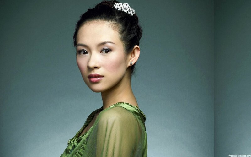woman in green dress with tiara