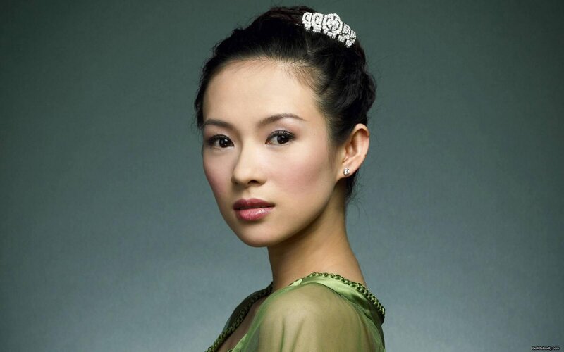 woman in green dress with tiara