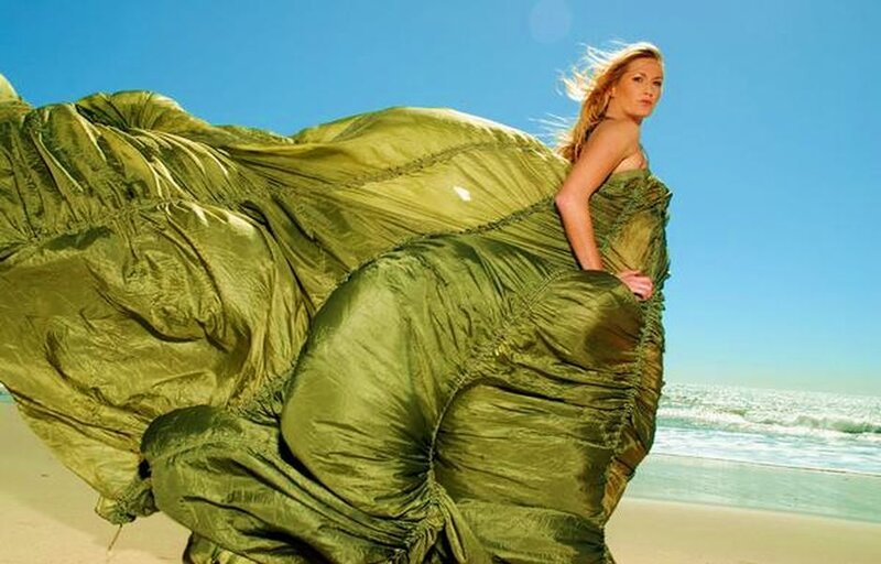 Woman in Green Fabric — Dramatic
