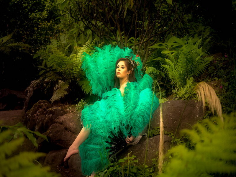 Woman in Green Feather Costume