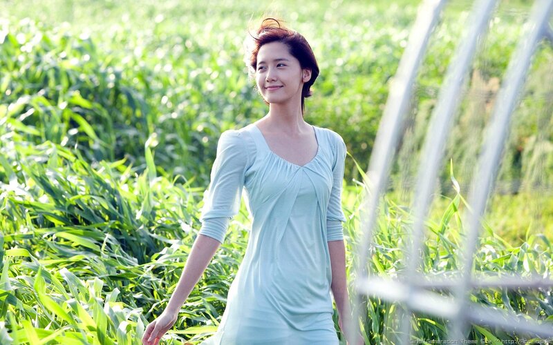 woman in green field