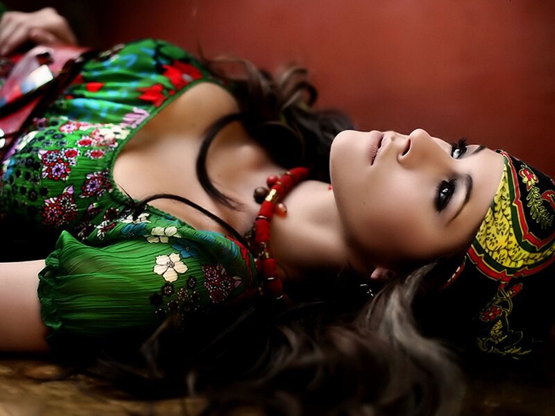 woman in green floral dress