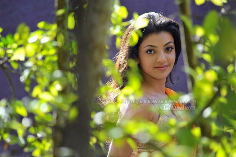 woman in green foliage