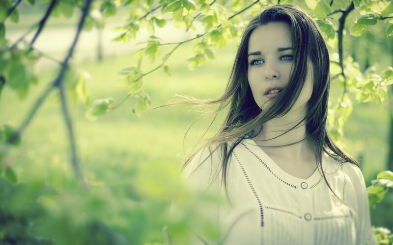 woman in green forest