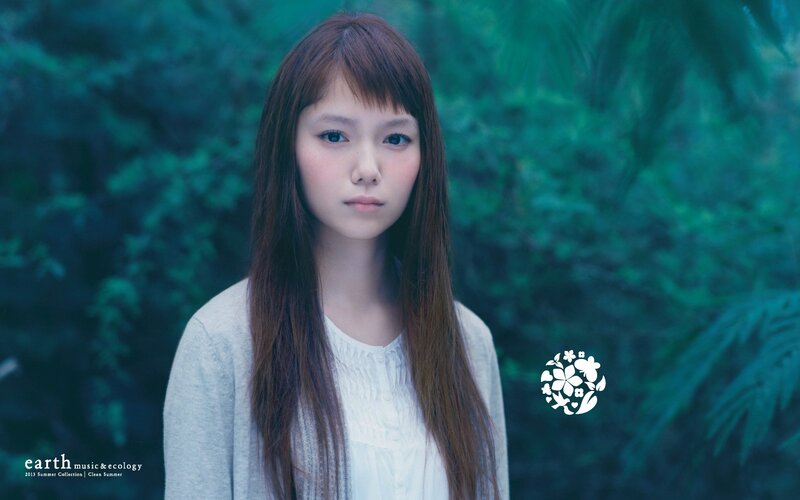 woman in green forest
