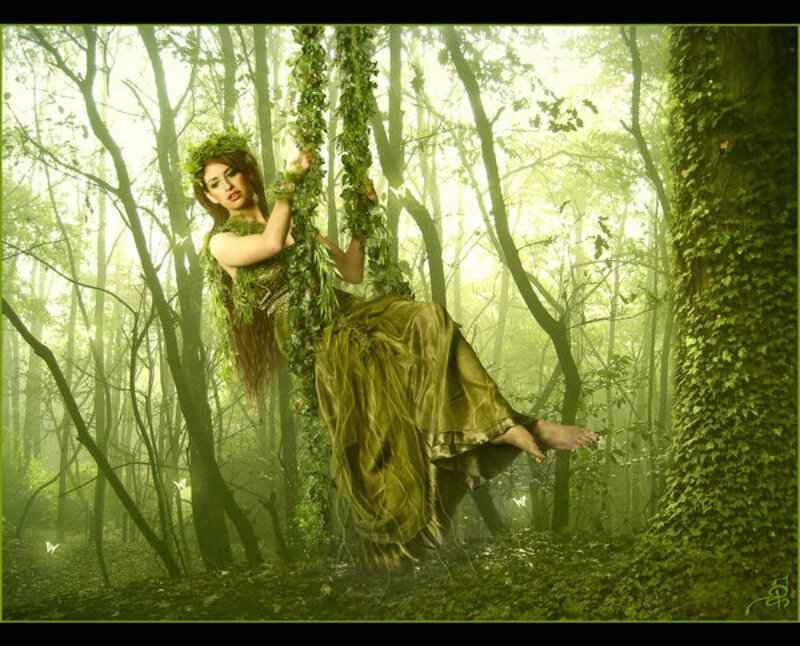 woman in green forest attire