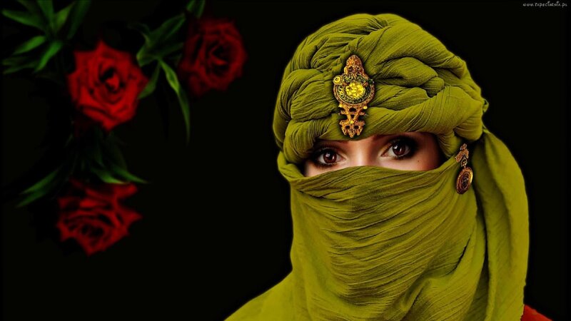 woman in green headscarf