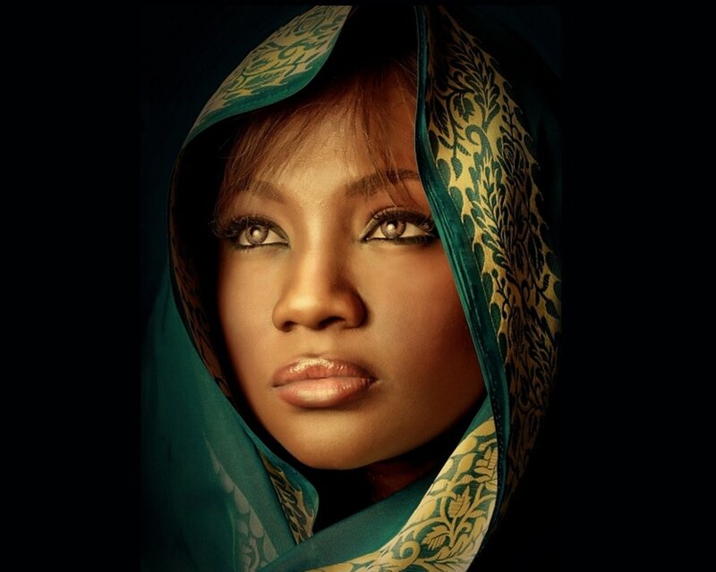 woman in green headscarf