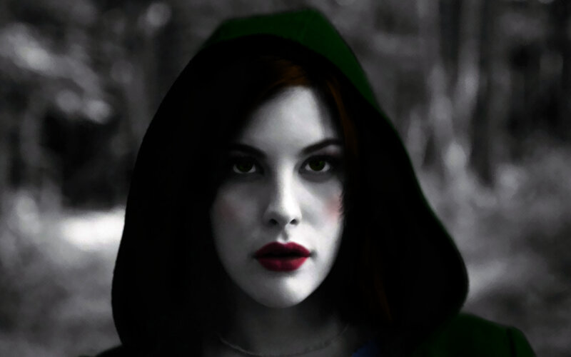 woman in green hood