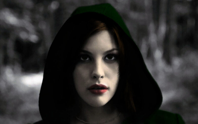 woman in green hood