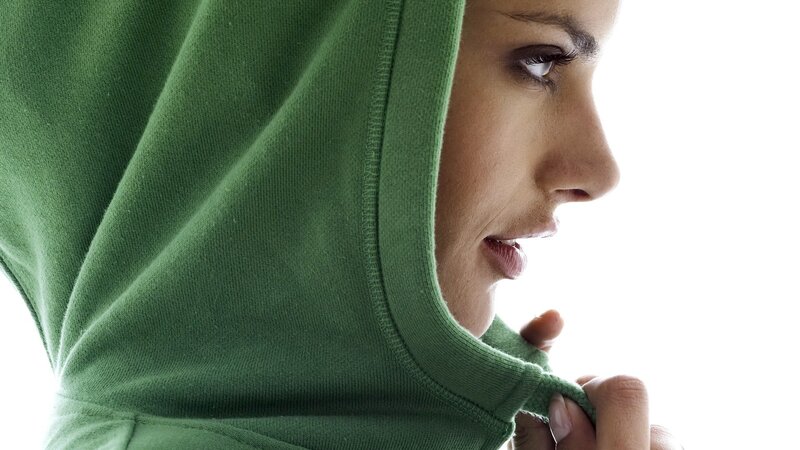 woman in green hoodie