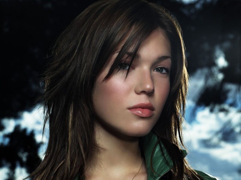 woman in green jacket