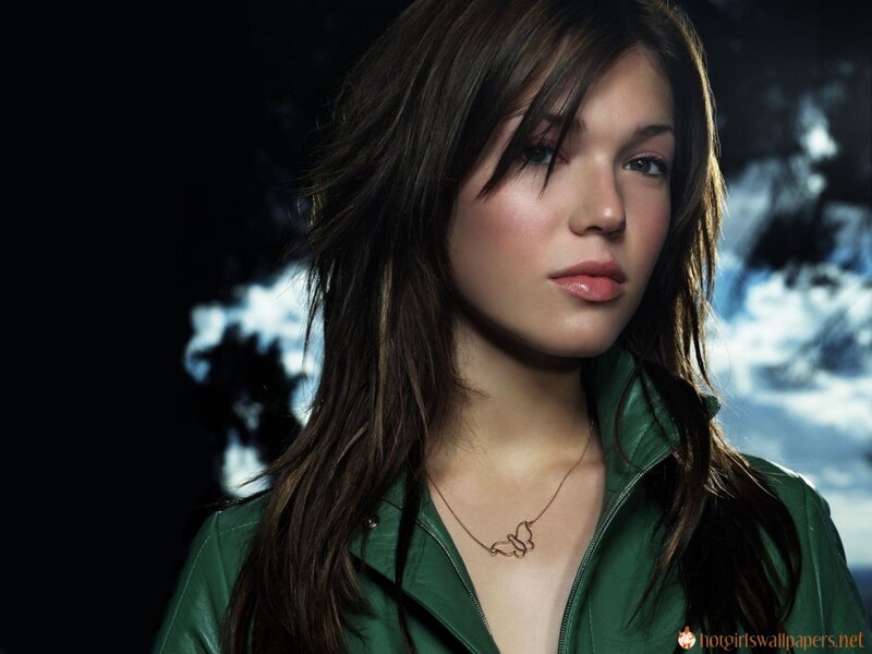 woman in green jacket