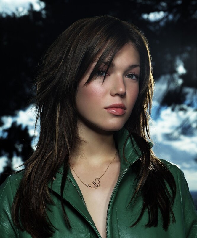 woman in green jacket