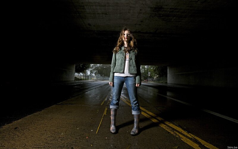 Woman in Green Jacket — Dramatic, Night, Photograph