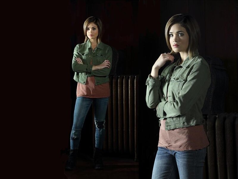 Woman in Green Jacket — Dramatic, Photograph, Jeans