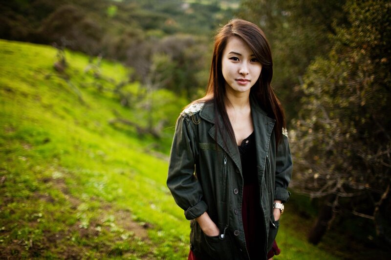 woman in green jacket outdoors