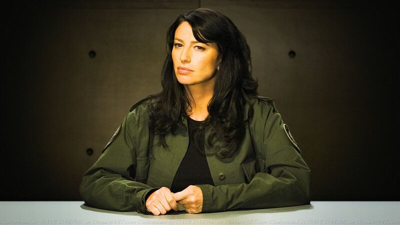 Woman in Green Jacket — Serious, Photograph, Table