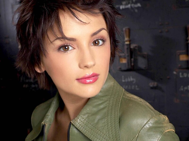 woman in green leather jacket