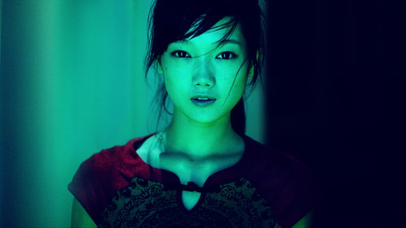 woman in green light