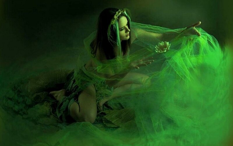 woman in green mist