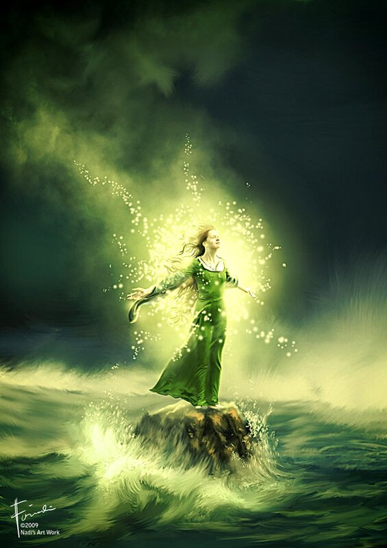 woman in green on a rock
