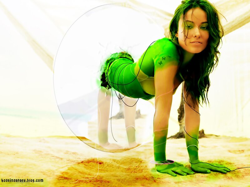 woman in green on beach