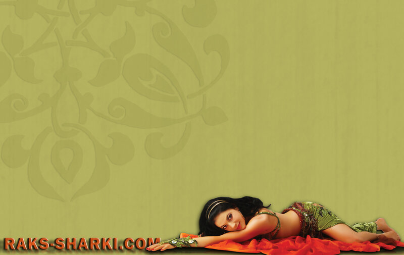 woman in green outfit lying down