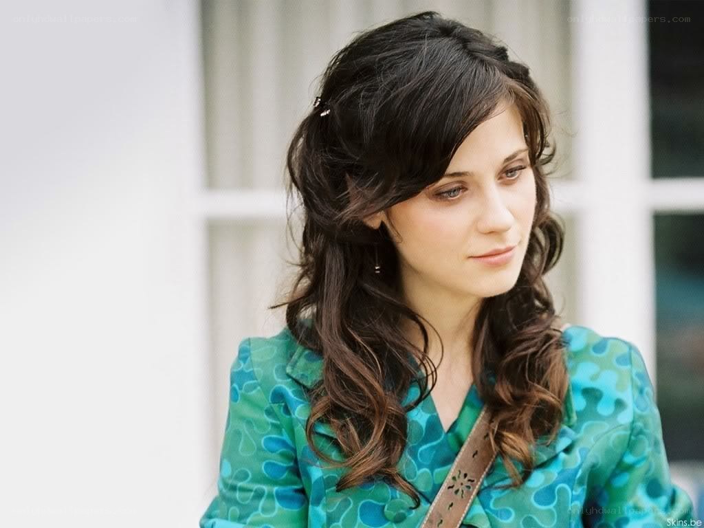 woman in green patterned jacket