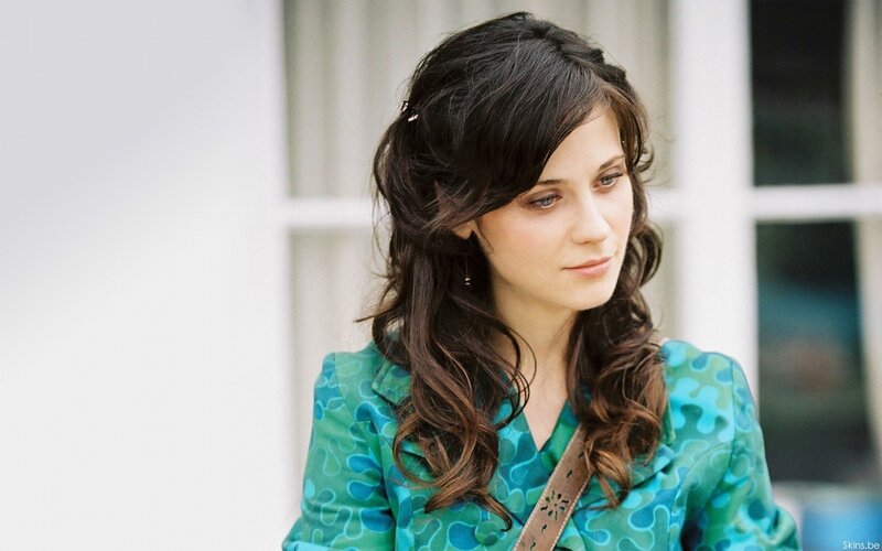 woman in green patterned jacket