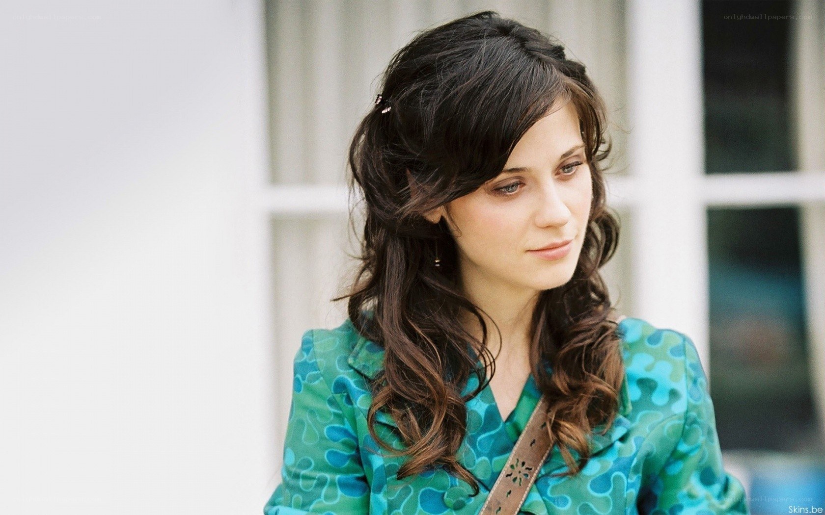 woman in green patterned jacket