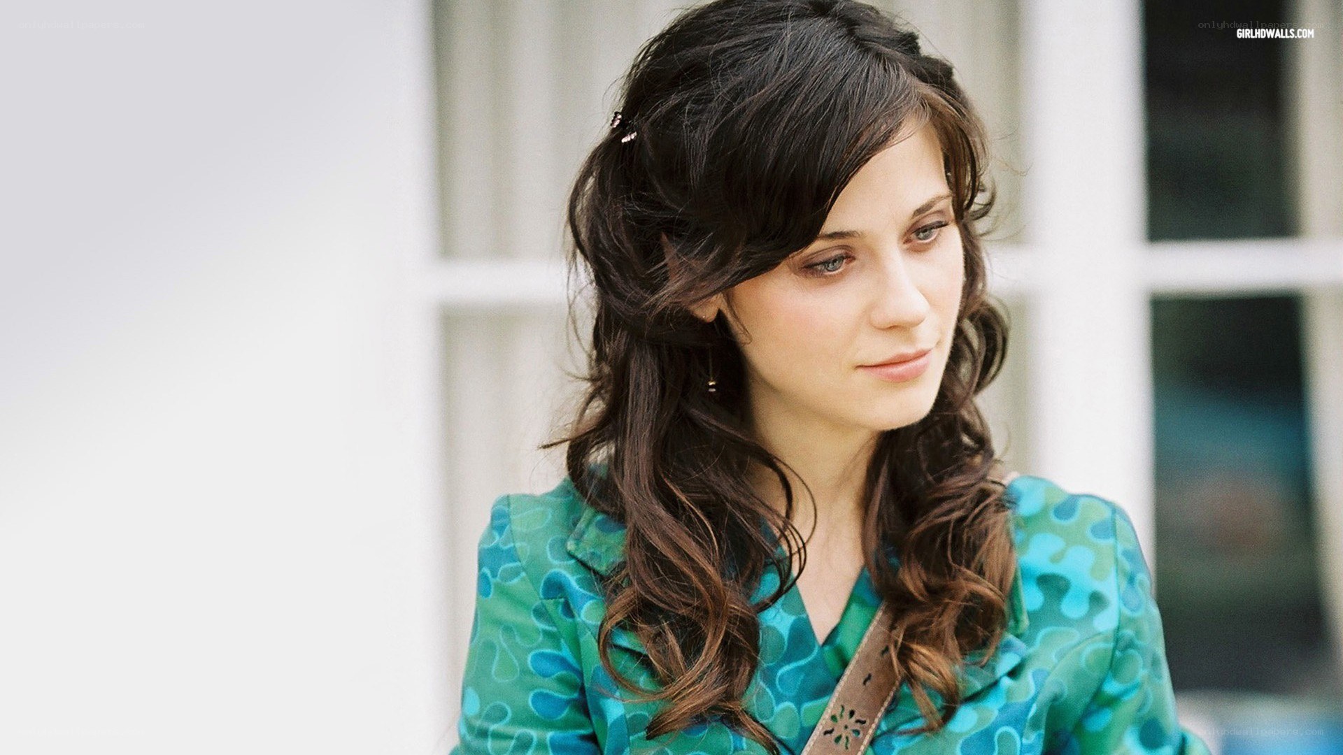 woman in green patterned jacket