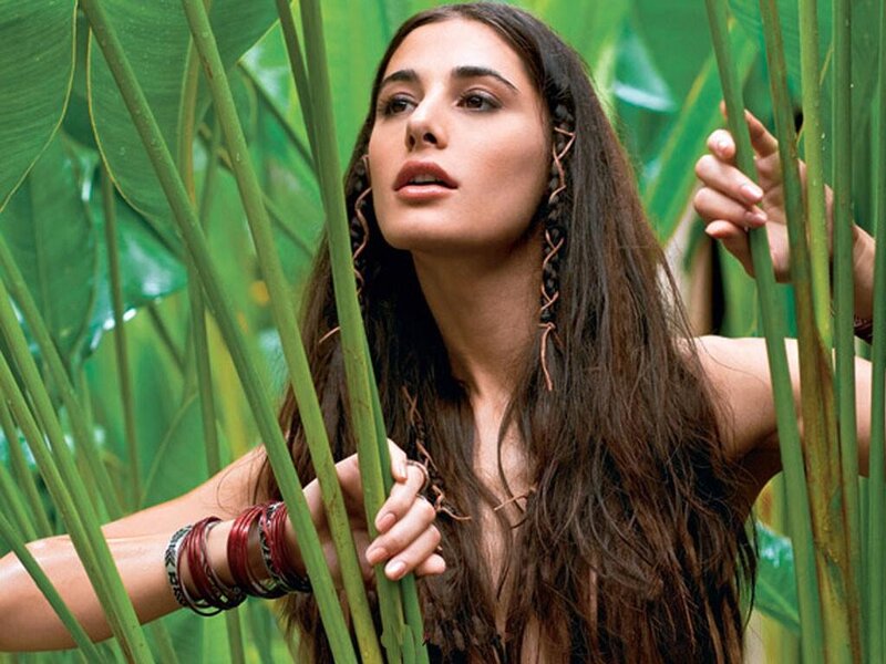 Woman in Green Plants