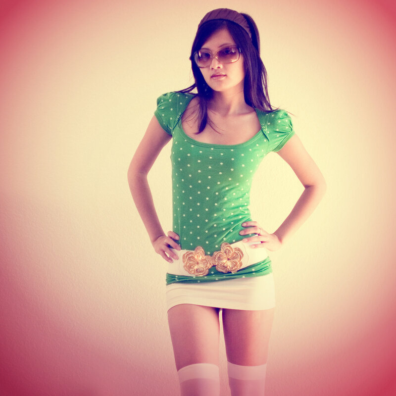 woman in green polka-dot top