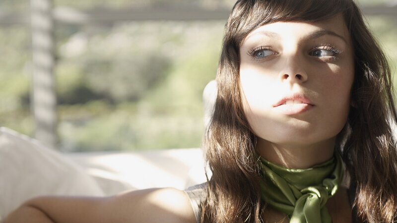 woman in green scarf