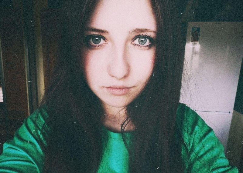 woman in green shirt