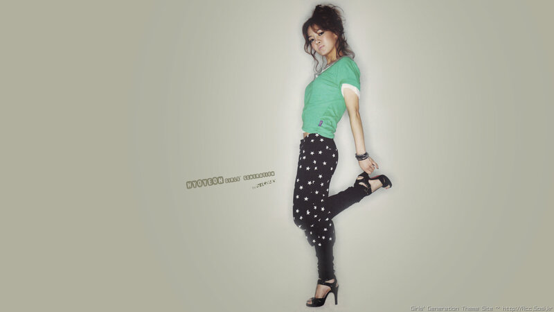 Woman in Green Shirt — Confident, Photograph, Star-patterned Pants