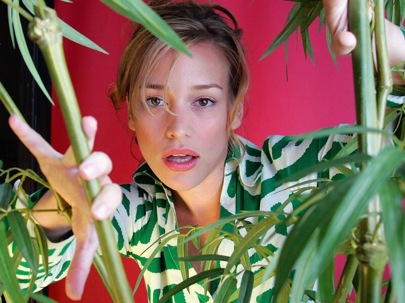 Woman in Green Shirt — Curious